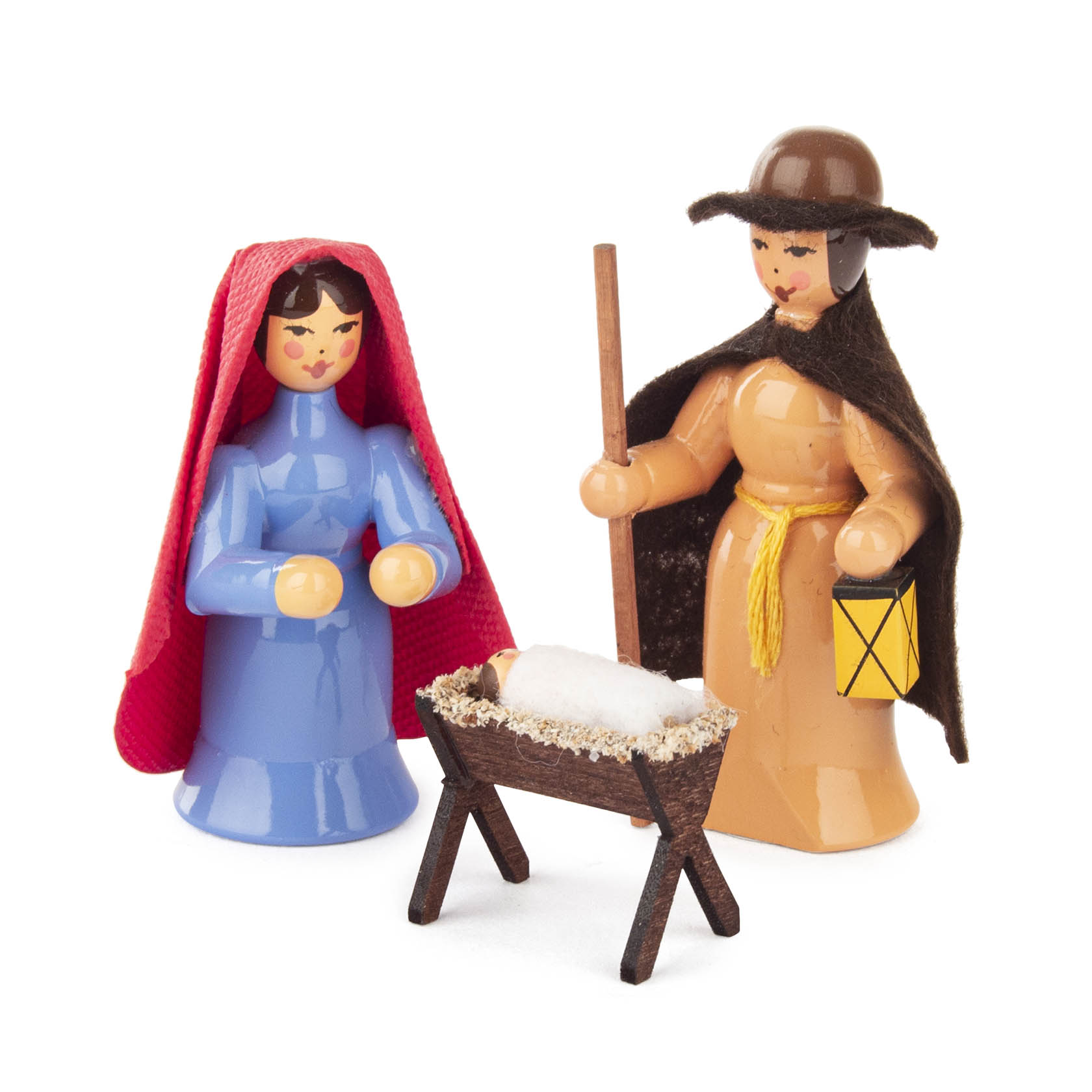 Bunte Krippenfiguren: Maria in blauem Gewand mit rotem Schleier, Josef in braunem Mantel mit Laterne und Stock, vor einer Krippe mit dem Christkind. im Dregeno Online Shop günstig kaufen