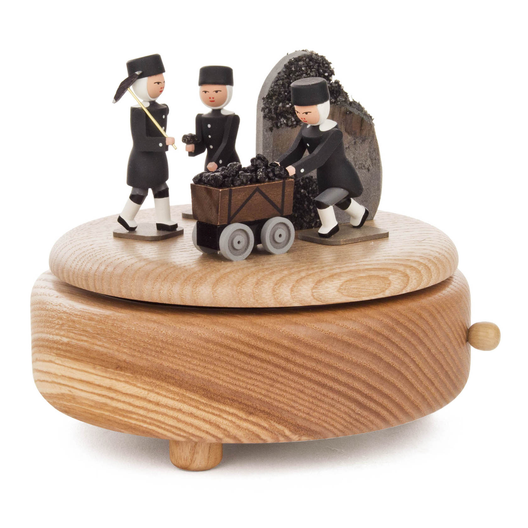 Holzspieldose mit drei Bergleuten in traditioneller Kleidung, die Kohle in einen Wagen laden und vor einem Kohlehaufen stehen. im Dregeno Online Shop günstig kaufen